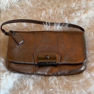 Coach leather clutch with strap